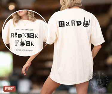 A woman wearing a white t-shirt with the text